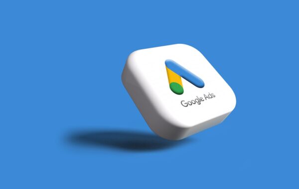 a white google logo on a blue background