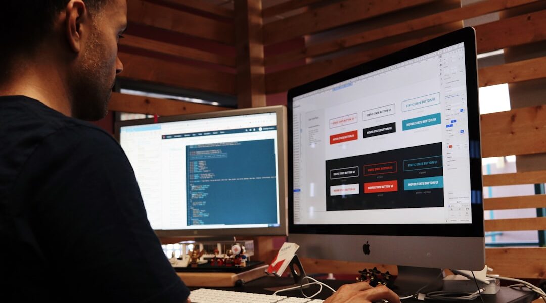 man using Apple computer