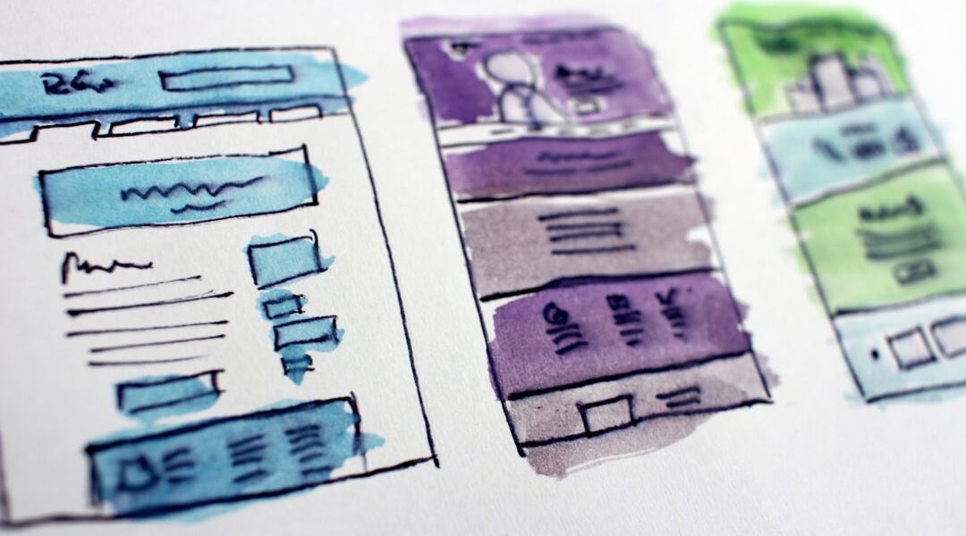 watercolor wireframe sketches of website layouts
