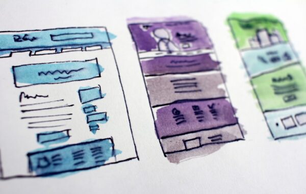 watercolor wireframe sketches of website layouts